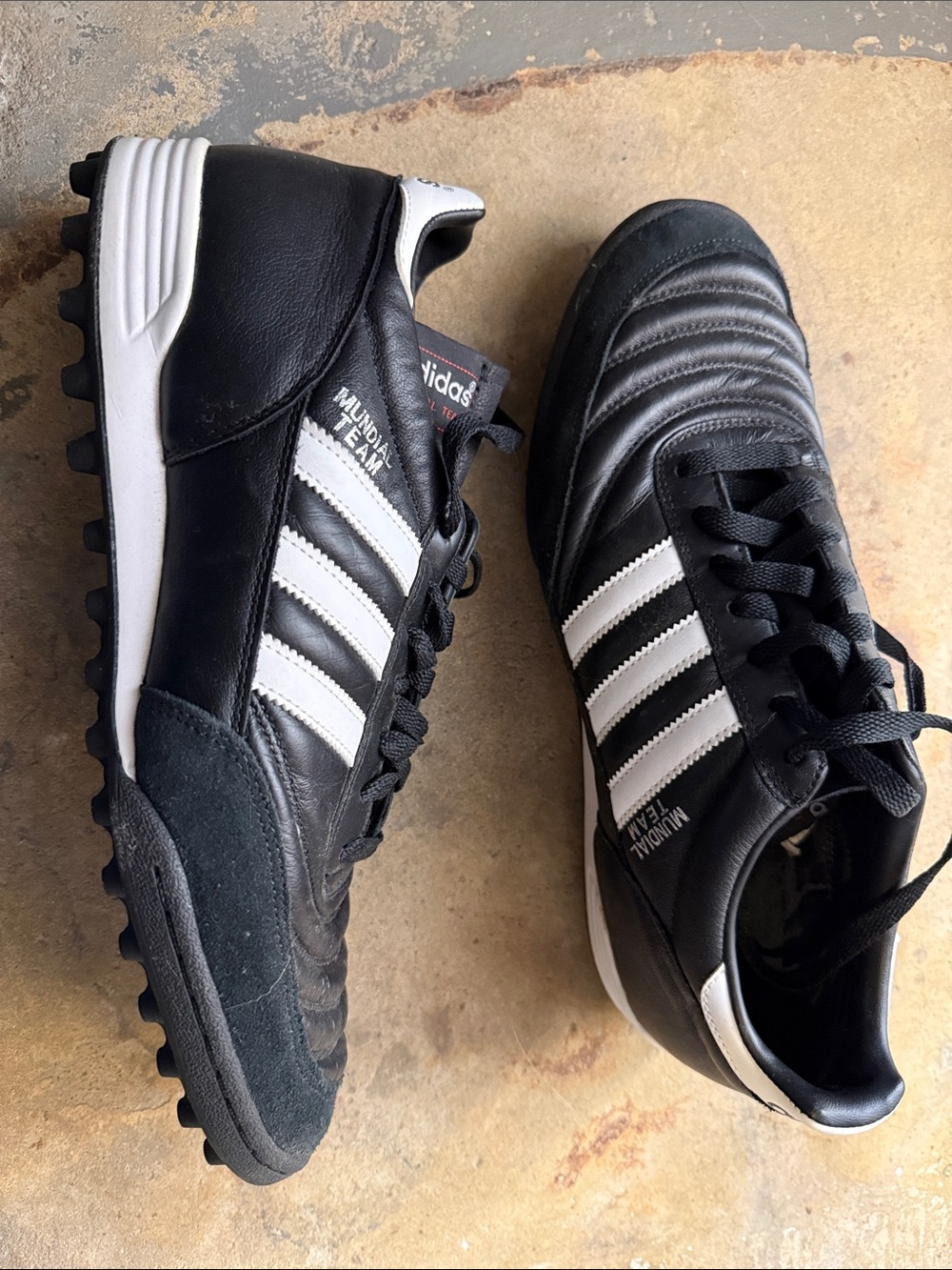 adidas Black and White Men’s Turf Soccer Sneakers